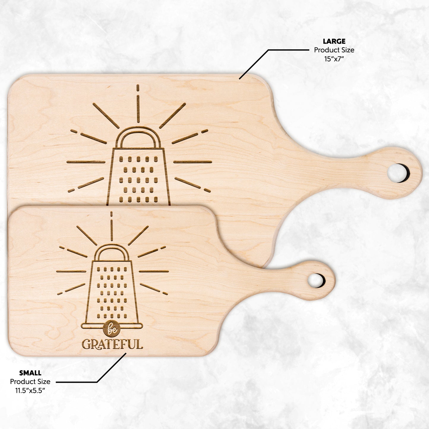 two sizes of maple cutting board with a cheese grater with the words "be grateful" engraved on the cutting board on a white background