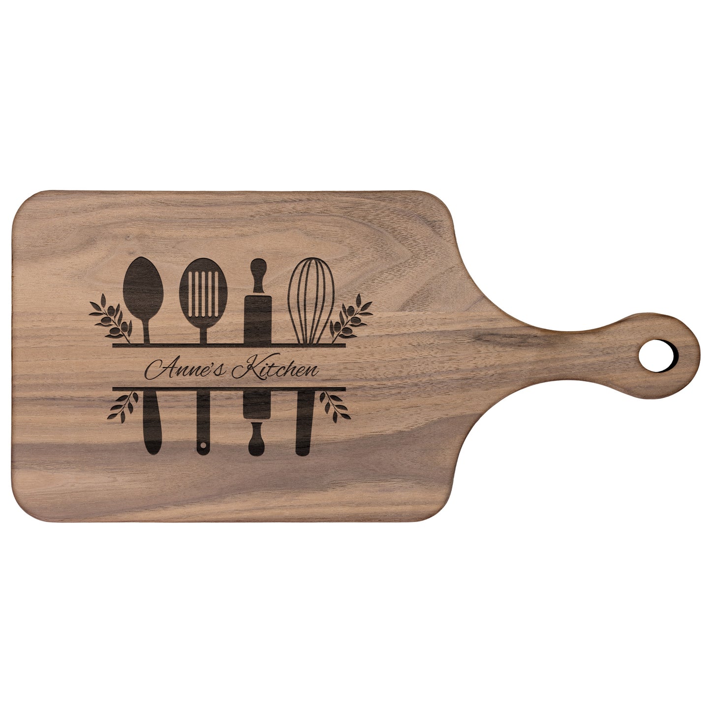 view of a personalized walnut paddle cutting board on a white background