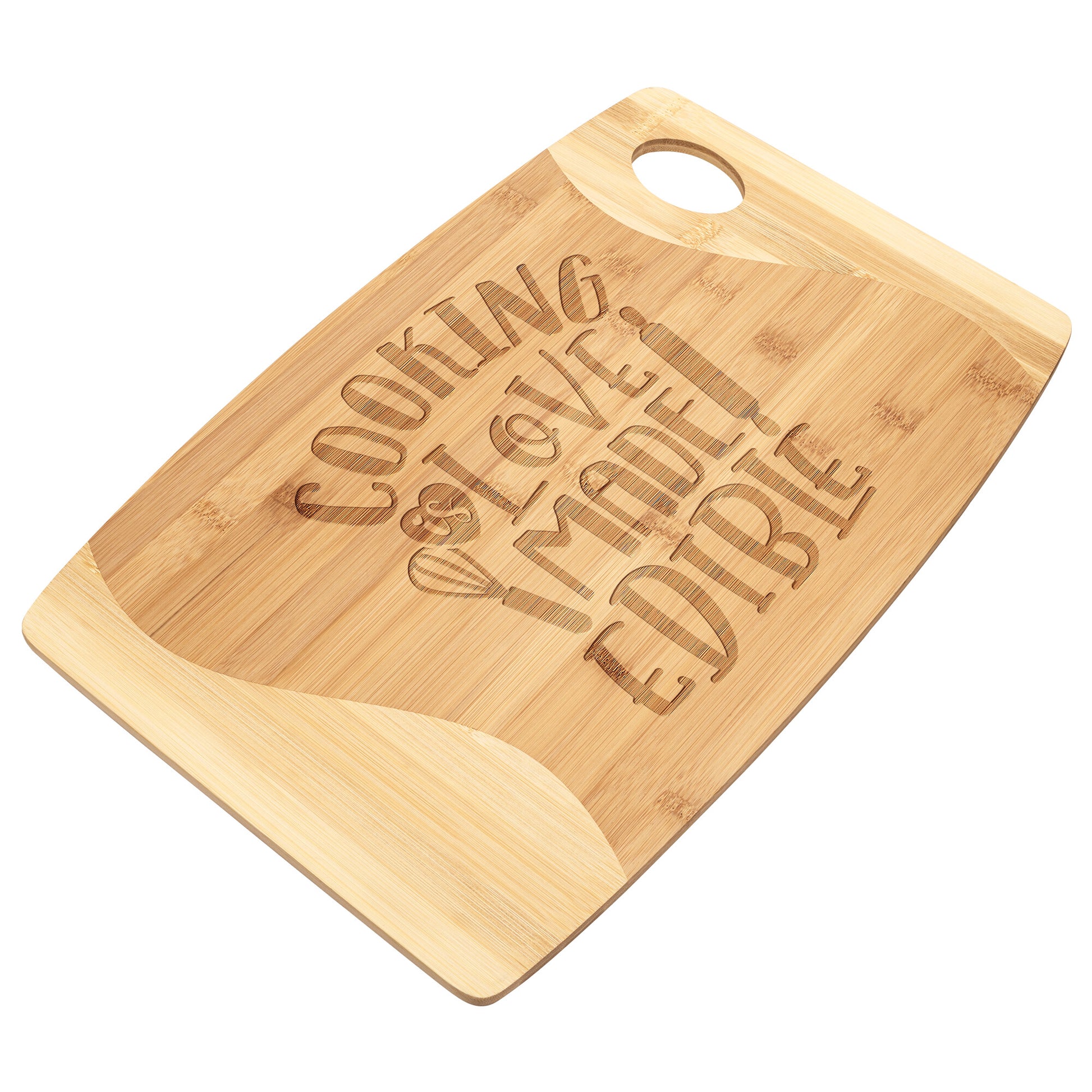 Bamboo cutting boards with words "Cooking is Love Made Edible" on a white background